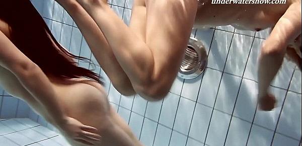  Iva Brizgina and Paulinka hot softcore lesbians in the pool